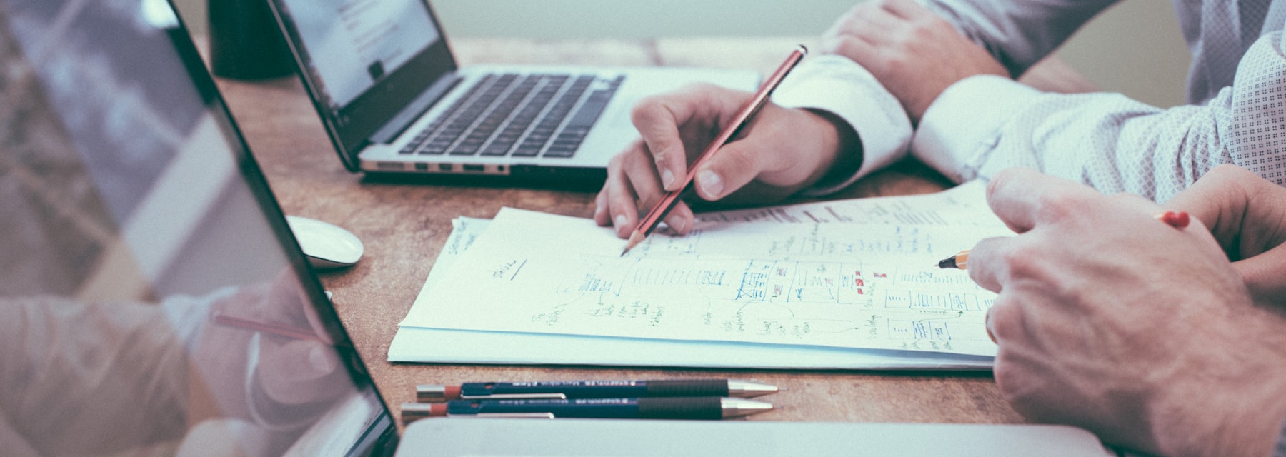 Business planning documents and laptop